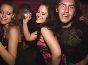 Pretty amateur teens with long hair dancing erotically in a party at the club