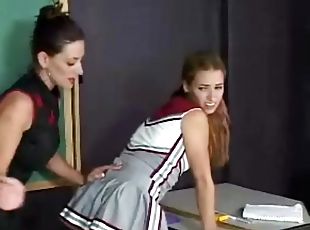 Sexy teacher spanks a hot cheerleading student in class