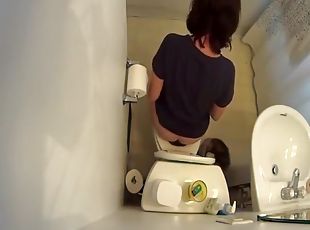 Hidden cam over the toilet catches woman peeing