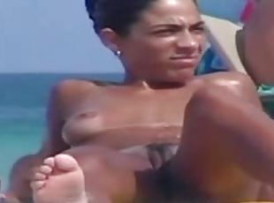Naked women caught on a hidden cam on a nude beach