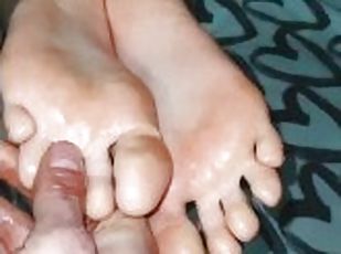 Massaging oiled feet to cute teen. I love her little feet.