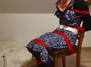 Girl Chairtied With Ropes And Scarf