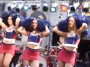 Cheerleaders in short skirts on stage at show