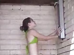 Drunk brunette teen goes crazy while taking a shower