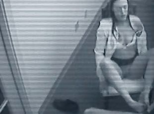 This babe gives a strip show to some dude under the security cam