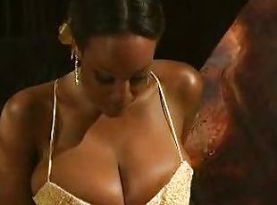 Black girl in ball gown plays with big tits