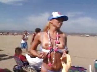 Pretty women on a beach get frisky with their hot bodies